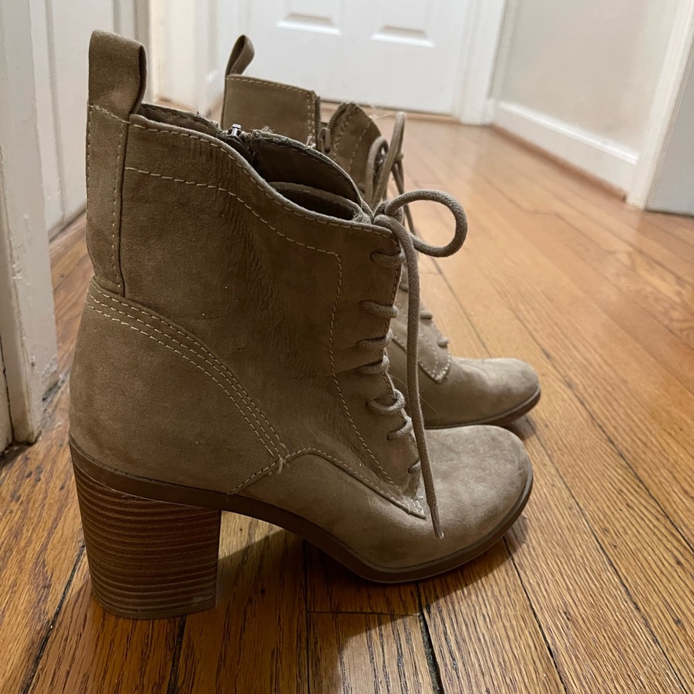 Tan combat boots with a heel